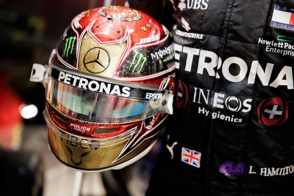 Lewis Hamilton's 2019 British GP winning helmet and 2022 Mercedes AMG Petronas race suit