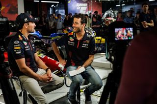 Red Bull drivers Sergio Perez and Daniel Ricciardo are interviewed at Silverstone Museum over the British GP F1 weekend in July 2023.