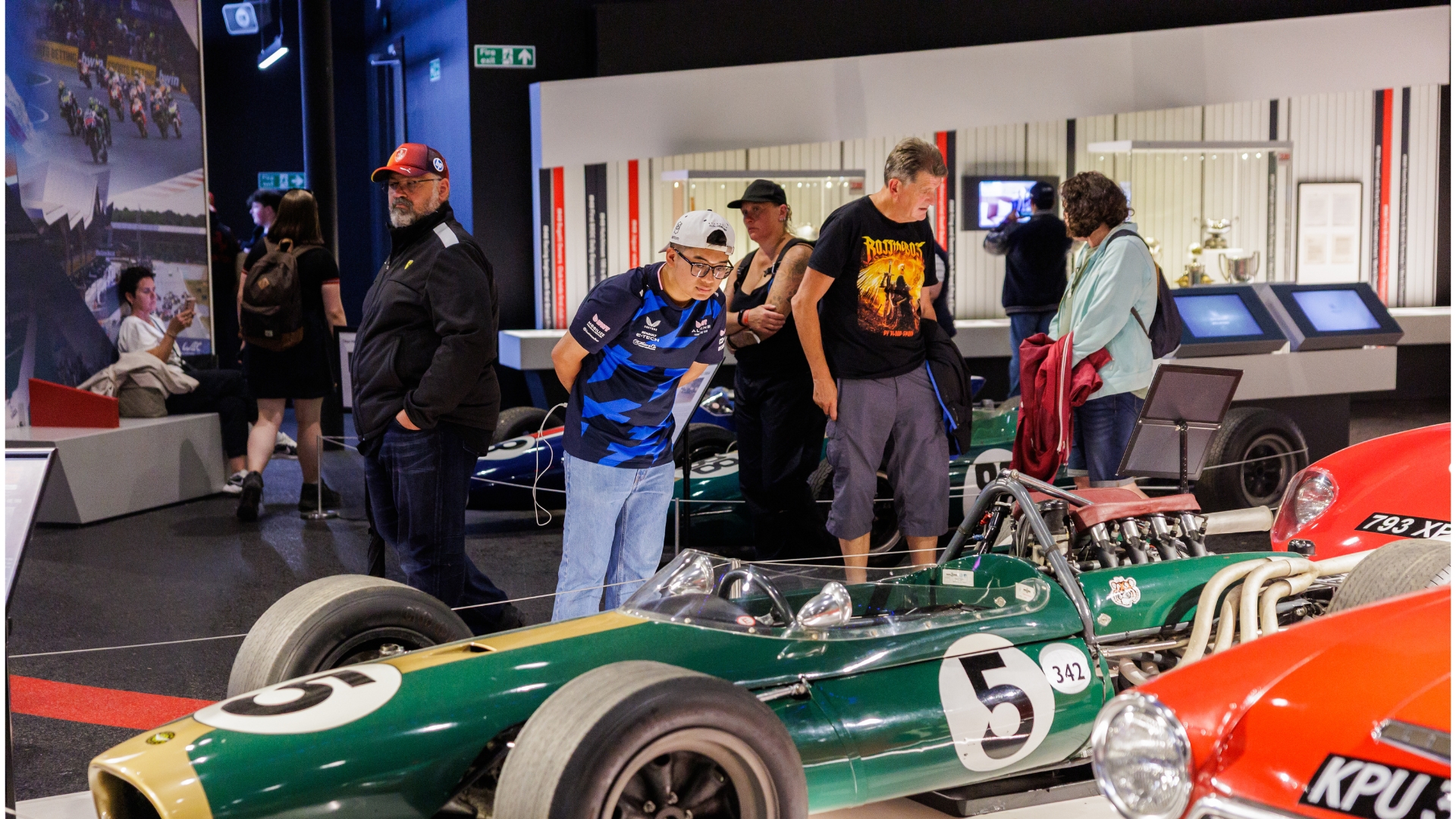 Visitor Looking At Car Exhibit 2